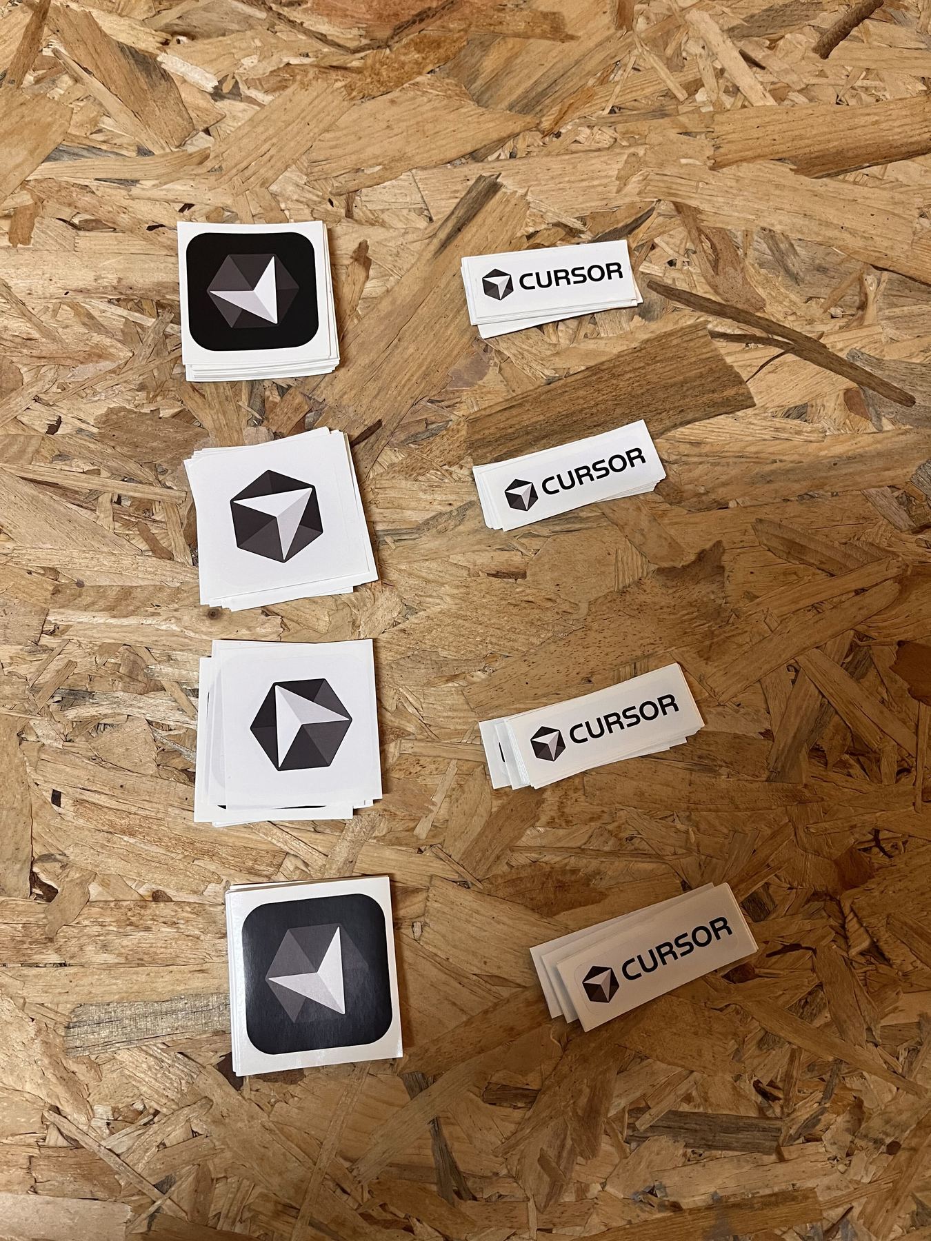 Cursor logo stickers and swag on the event table